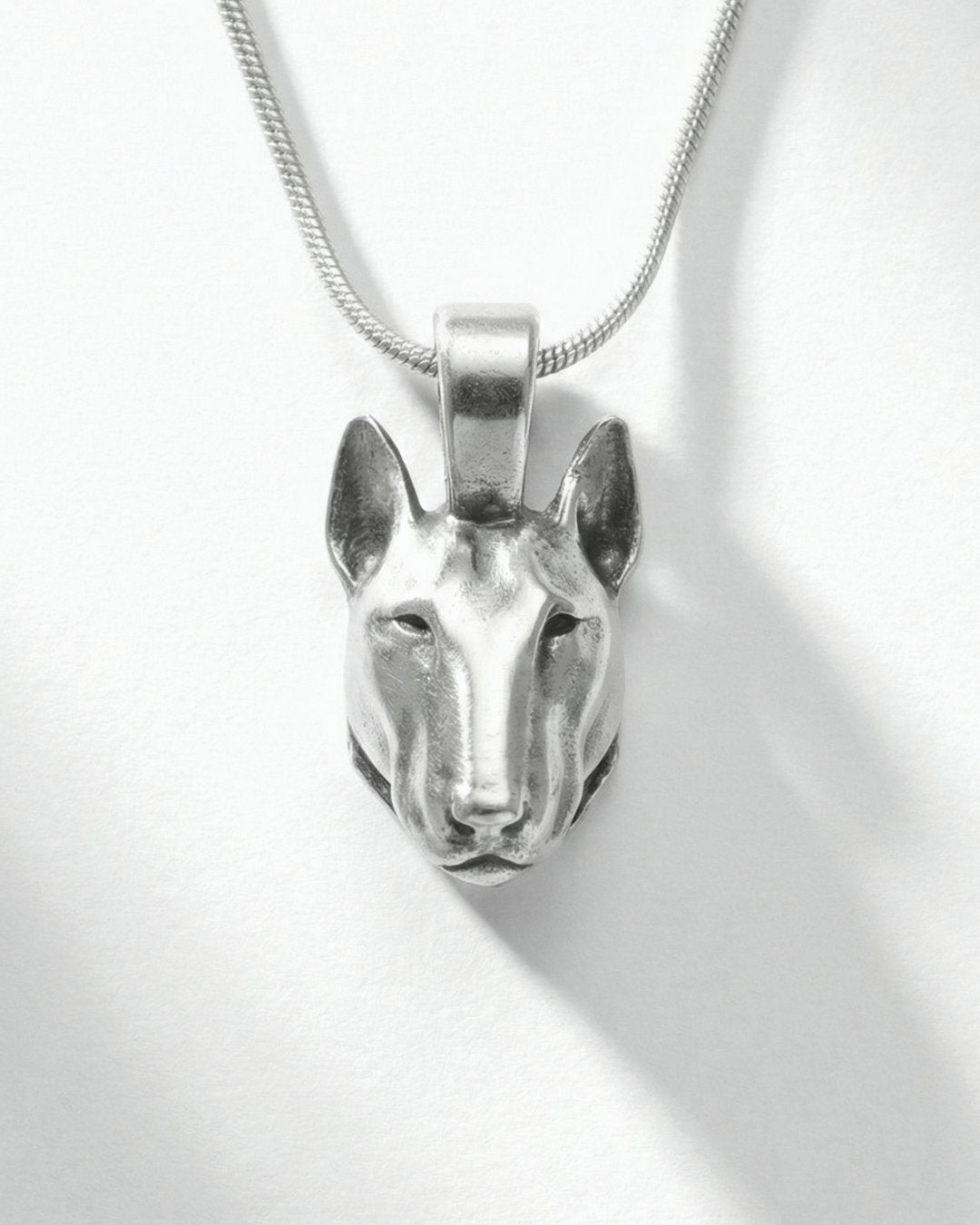 Silver Bull Terrier dog pendant necklace on a white background