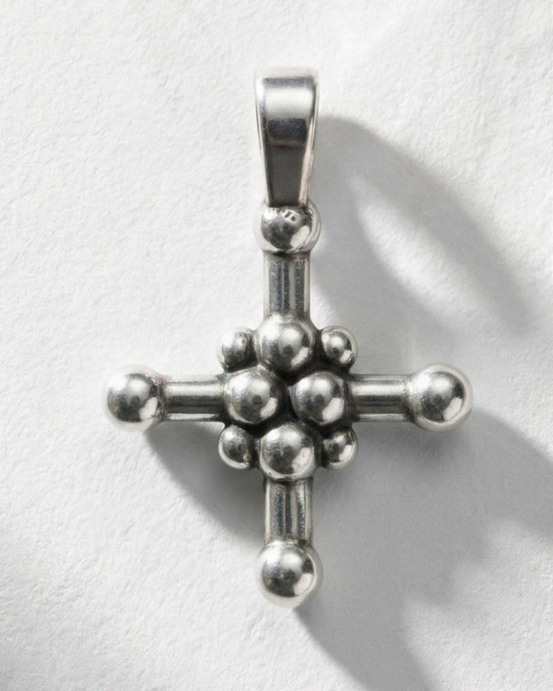 DOT CROSS ®