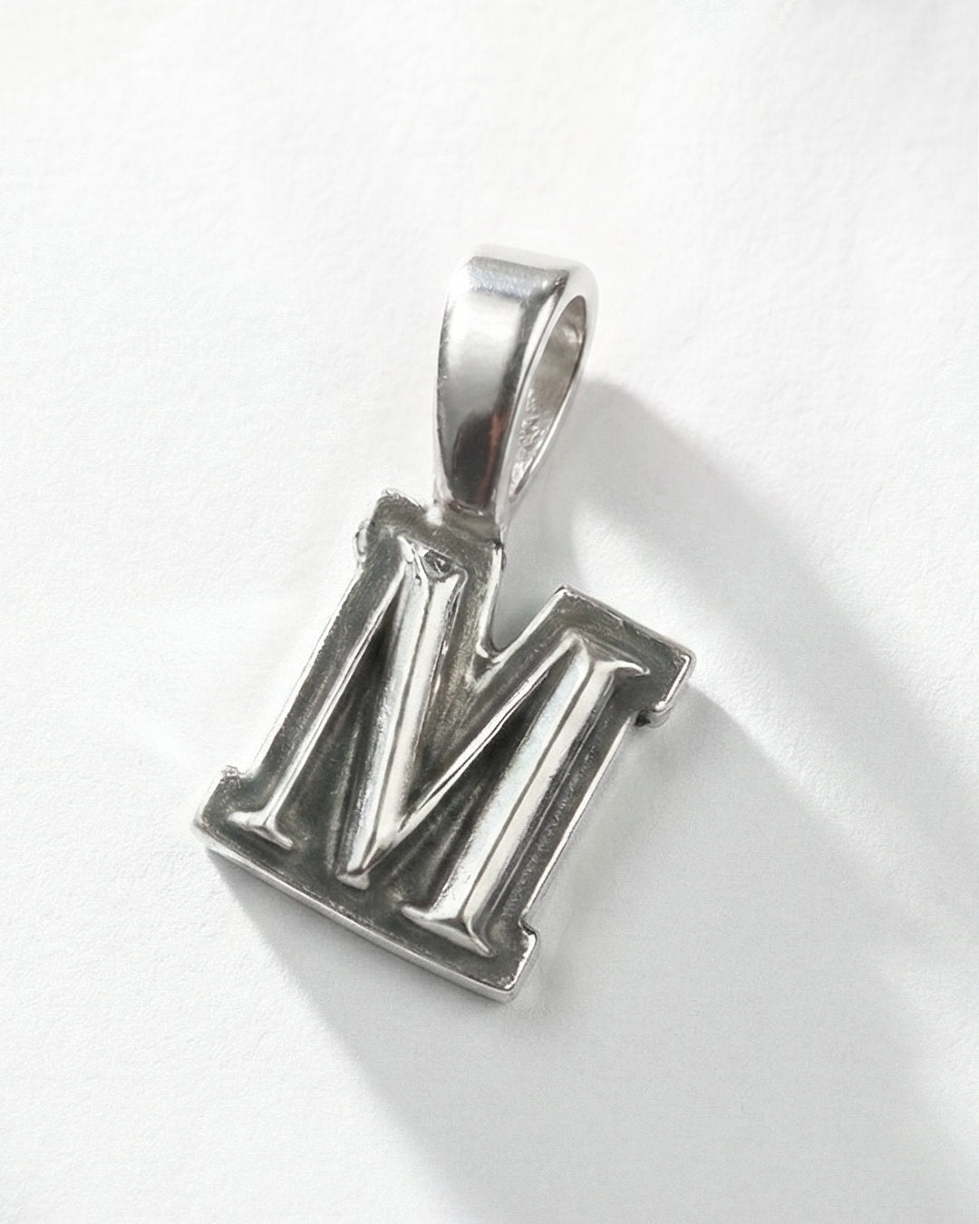 M / PENDENT ®