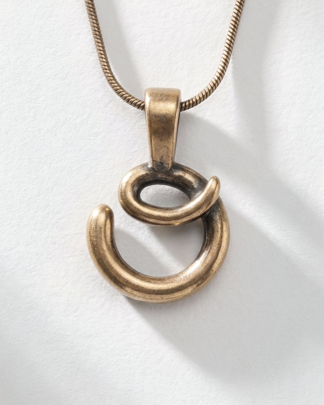 O / PENDENT ®