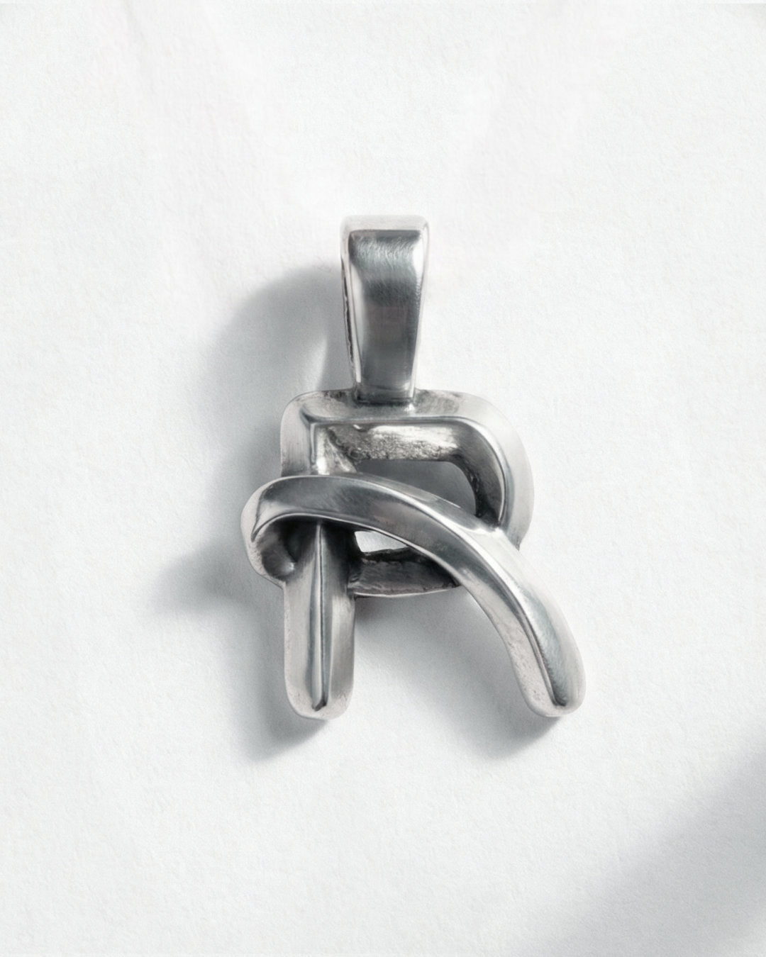R / PENDENT ®